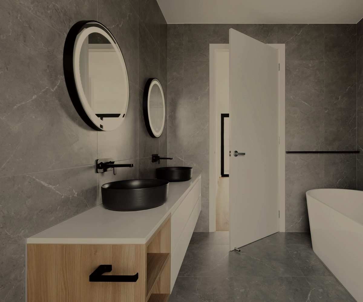 Renovated bathroom with a custom vanity and tile